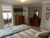 The Inn at Highland Lake, 2nd Floor, waterfront yard with a boat dock