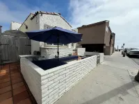 Stunning Spanish Cottage Ocean Views Steps from the Ocean in Newport Beach!