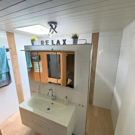 Exclusive apartment with large roof terrace near the beach with sauna