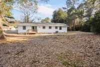 4 bedroom, King Bed, 4 min to Fairgrounds, TVs in all Rooms