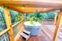 Robin's Nest is an authentic log cabin built with hand-hewn logs from the 1800's