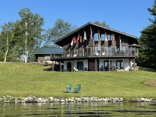 Waterfront Chalet with expansive views of lake & mountains.