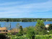 Spacious home in Hancock Twp. Includes indoor sauna! Pet-friendly.