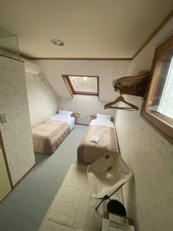 Yatsugatake Fujimi Kogen Pension Bell Отели рядом с достопримечательностью «Idojiri Archaeological Museum»