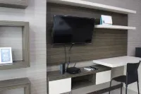 Prime and Comfy Studio at Tamansari la Grande Apartment by Travelio