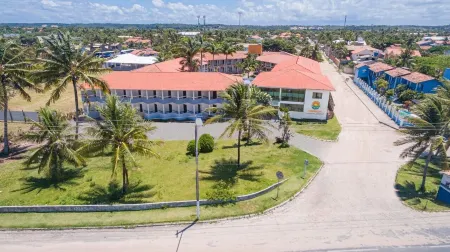 Sueds Segundo Sol Отели рядом с достопримечательностью «Coroa Vermelha Beach»