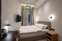 Hop Inn Rooms & Suites