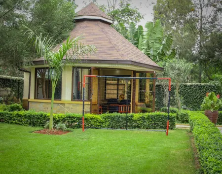 The Cottage Residence Karen Отели рядом с достопримечательностью «Шелдрик Уайлдлайф Траст Нерсери»