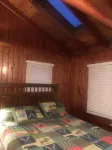 Indian Lakes Cabin with private beach and dock lake side