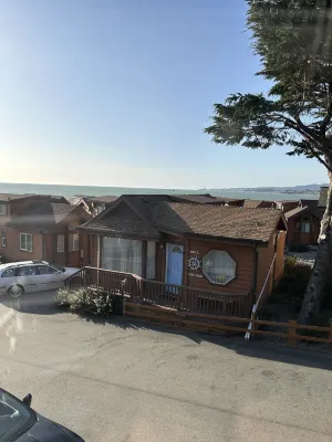 Jacuzzi and Spacious Deck - Charming Coastal Hideaway