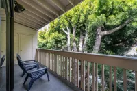 Charming Condo with Private Deck and Gated Parking - Serene Coastal Retreat