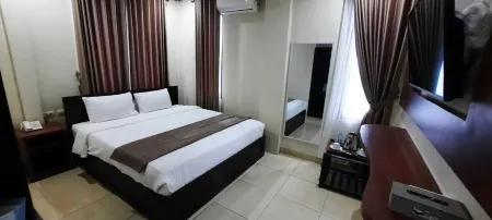 Am Hotel Отели в г. Menteng