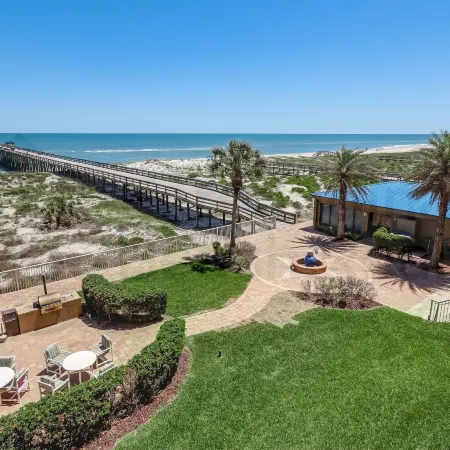 Upper Unit Overlooking the Beautiful Outdoor Space and Pier