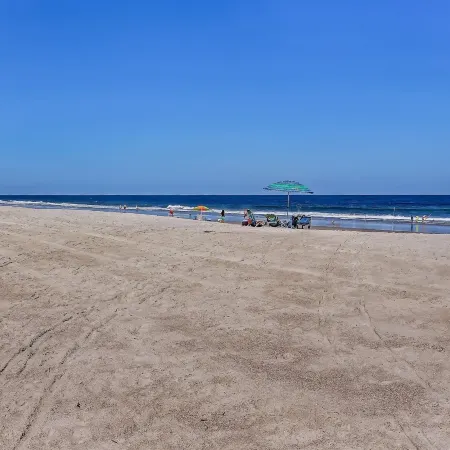 Oceanfront Beach Escape Condo with WiFi by RedAwning