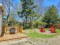 5 min to Agawa Train | Cozy Oasis w/Firepit & Deck Hotels near Sault Ste. Marie Canal National Historic Site