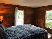 Red Bend cabin overlooking the river with hot tub.