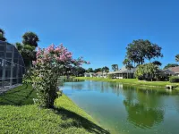Sadie's Daytona private pool home with 5 king beds , pool table and arcade games