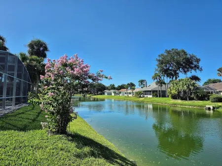 Sadie's Daytona private pool home with 5 king beds , pool table and arcade games