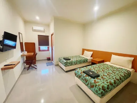 Hotel Akat Merauke Отели рядом с достопримечательностью «MONUMEN KAPSUL WAKTU»