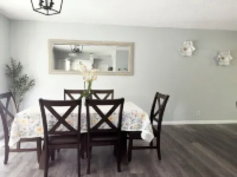 Beautiful Home in quiet neighborhood with a pool and close to stores & highways.