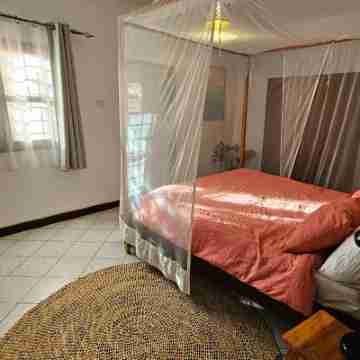 Nestled in Muyenga, Jjajja's Cottage offers a calm, quiet and cozy retreat. Rooms