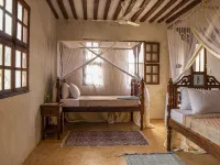 Dive in to our pool and feel the breeze at Mbibo House in the Shela sand dunes Hotels in Shela