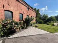 Quiet, spacious and light-flooded apartment/loft with large courtyard garden