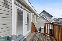 Private Backyard and Modern Kitchen - Charming Coastal Haven