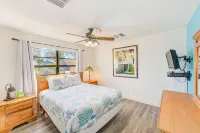 Waterfront oasis with private heated & screened pool, dock w/boat lift. 3BR/2BA