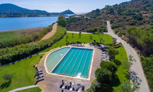 Baia Chia Laguna Resort, Curio Collection by Hilton