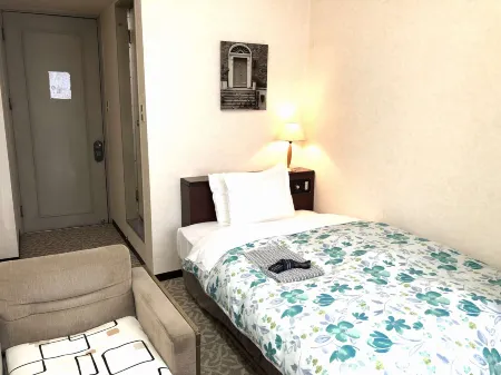 Garden Hotel Yamato Отели рядом с достопримечательностью «Замок Хиконэ»