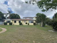 Watch Florida sunsets from the covered lakefront dock Hotels in Minneola