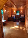 QUINTESSENTIAL MAINE LOG CABIN SET ON GORGEOUS LAKE