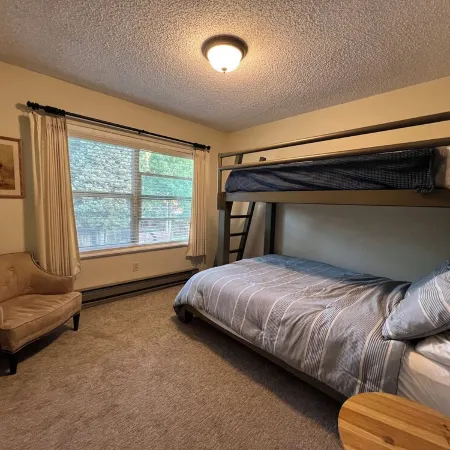 Family condo, walk to ski area, private fishing pond and playground
