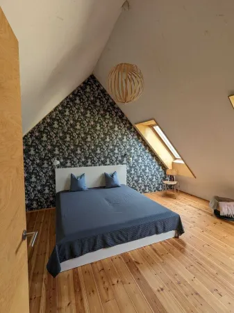 Modern wooden house on the Bodden with two apartments that can be combined