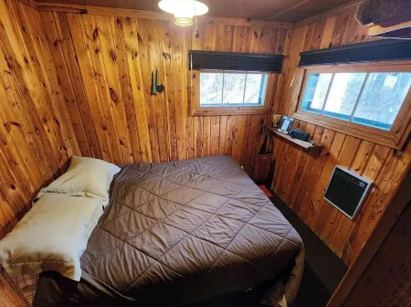 Cozy cabin with backyard stream close to Au Sable River and the best ATV trails