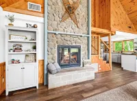Secluded 4-season cabin w/private waterfront, epic game room & mins from trails