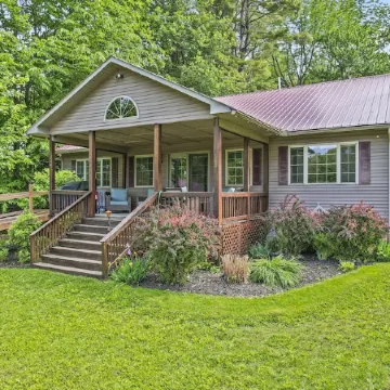 Quiet lake front home with private beach