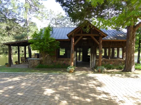 A rustic stone cottage on an estate close to the Texas State Railroad.