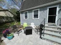 Lovely home near beaches. Ample yard with patio with enclosed porch & hot tub.