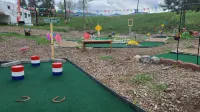 Camper at Minigolf Course COUGAR