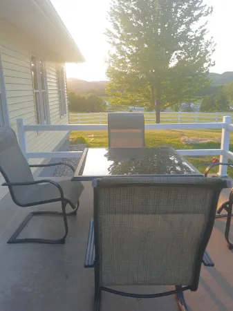 Country Charm Over River Valley And Horse Farm