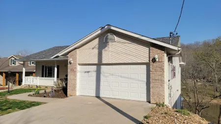 Beautiful lakefront house - calm cove, boat slip, amazing views, best location!