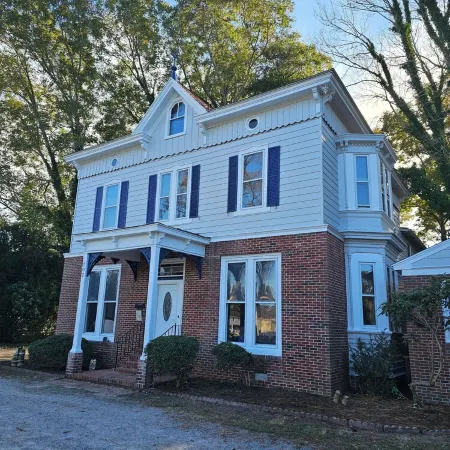 Timeless Elegance with Modern Luxury: Historic 6-Bedroom Home