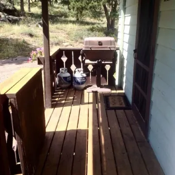 Stay in this charming vintage cabin with a wood burning fireplace,