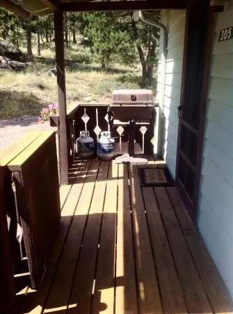 Stay in this charming vintage cabin with a wood burning fireplace,