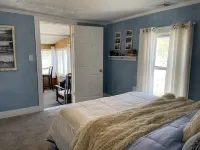 The Inn at Highland Lake, 2nd Floor, waterfront yard with a boat dock