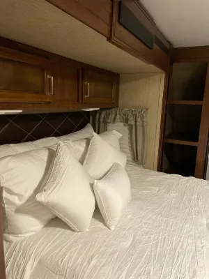 RV in foothills located near stores. Smoking area with fire pit provided.