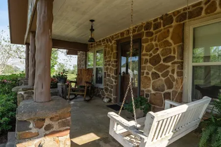 Historic Early Settler Farm House that Has Been Modernized For Your Comfort.
