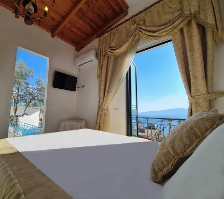 Olympia Hotel Отели в г. Дельвина